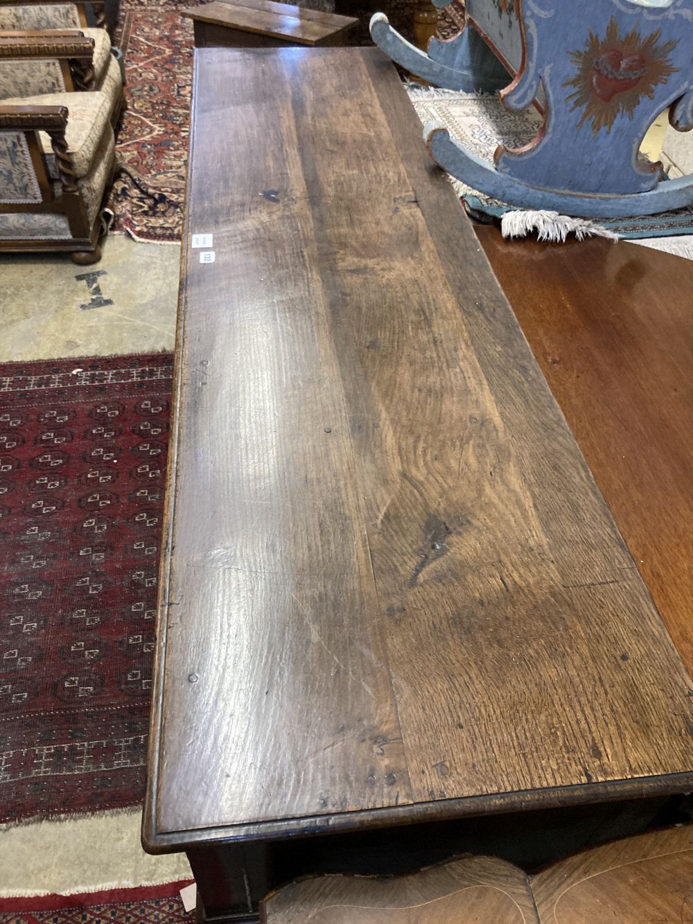 A mid 18th century oak low dresser, width 188cm depth 49cm height 83cm